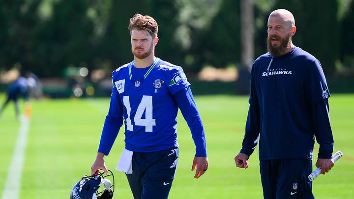 Jun 9, 2026; Renton, WA, USA; Seattle Seahawks quarterback Sam Darnold (14) and offensive coordinator Brian Fleury during minicamp at Virginia Mason Athletic Center. Mandatory Credit: Steven Bisig-Imagn Images Jun 9, 2026; Renton, WA, USA; Seattle Seahawks quarterback Sam Darnold (14) and offensive coordinator Brian Fleury during minicamp at Virginia Mason Athletic Center. Mandatory Credit: Steven Bisig-Imagn Images