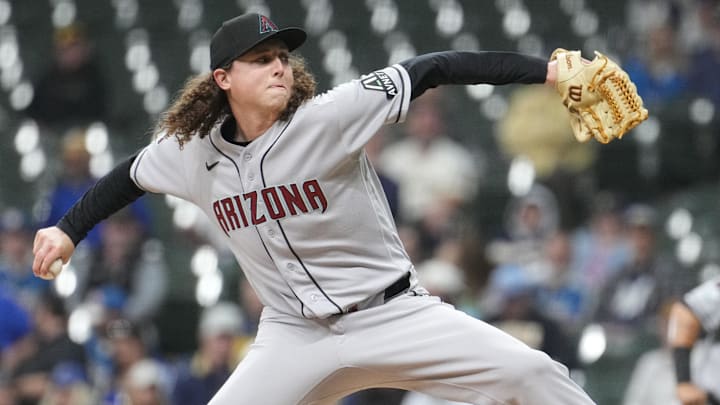 Apr 28, 2026; Milwaukee, Wisconsin, USA; Arizona Diamondbacks pitcher Andrew Hoffmann (56) delivers a pitch against the Milwaukee Brewers in the sixth inning  at American Family Field. Mandatory Credit: Michael McLoone-Imagn Images