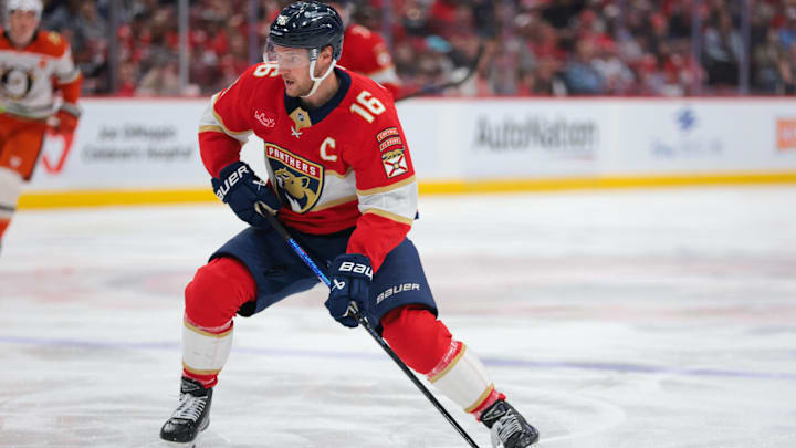 Jan 18, 2025; Sunrise, Florida, USA; Florida Panthers center Aleksander Barkov (16) moves the puck against the Anaheim Ducks during the first period at Amerant Bank Arena. Mandatory Credit: Sam Navarro-Imagn Images