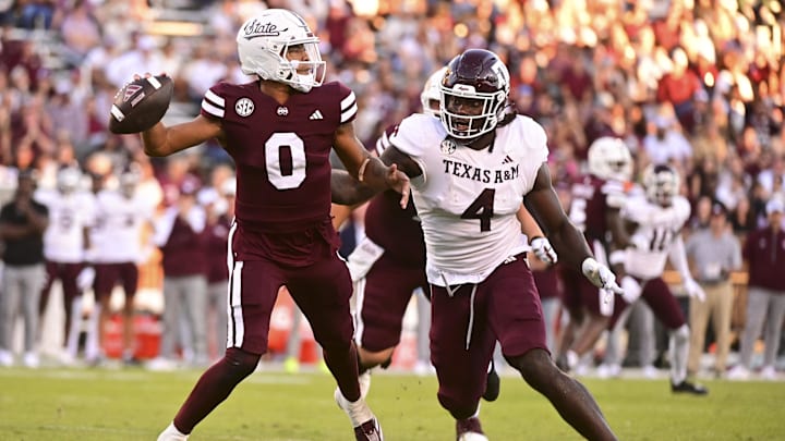 Oct 19, 2024; Starkville, Mississippi, USA;Mississippi State Bulldogs quarterback Michael Van Buren Jr. (0) drops back to pass against Texas A&M Aggies defensive lineman Shemar Stewart (4) during the third quarter at Davis Wade Stadium at Scott Field. Mandatory Credit: Matt Bush-Imagn Images Oct 19, 2024; Starkville, Mississippi, USA;Mississippi State Bulldogs quarterback Michael Van Buren Jr. (0) drops back to pass against Texas A&M Aggies defensive lineman Shemar Stewart (4) during the third quarter at Davis Wade Stadium at Scott Field. Mandatory Credit: Matt Bush-Imagn Images