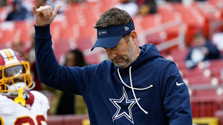 Dallas Cowboys head coach Brian Schottenheimer looks on during warmups before the game against the Washington Commanders 
