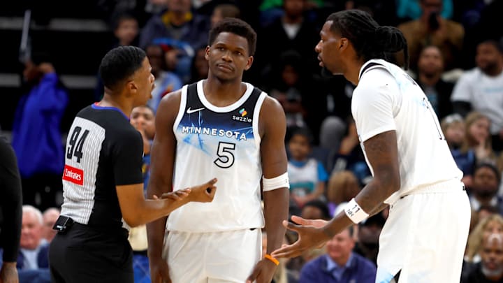 Minnesota Timberwolves guard Anthony Edwards (5) and center Naz Reid react toward an official during the second half against the Memphis Grizzlies at FedExForum in Memphis, Tenn., on Jan. 20, 2025.