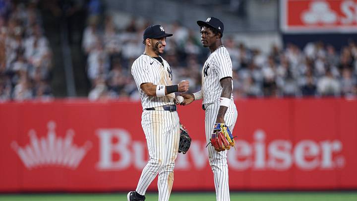 Apr 17, 2026; Bronx, New York, USA; New York Yankees second baseman Jazz Chisholm Jr. (13) and shortstop Jose Caballero (72) react during the ninth inning against the Kansas City Royals at Yankee Stadium. Mandatory Credit: Vincent Carchietta-Imagn Images