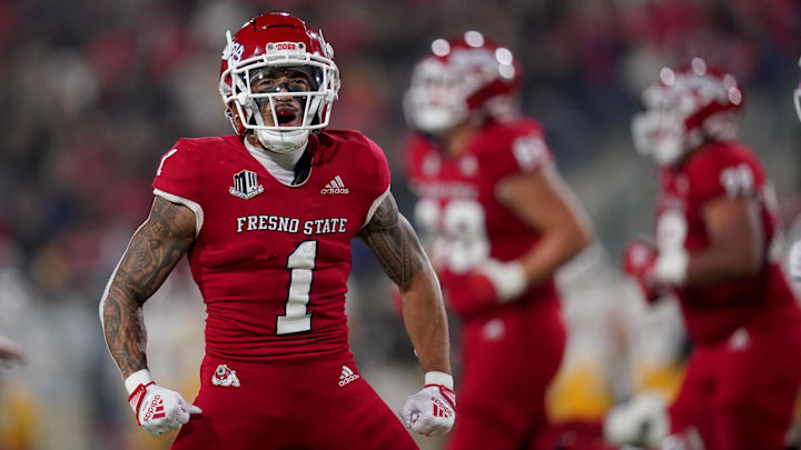 Nov 25, 2022; Fresno, California, USA; Fresno State Bulldogs wide receiver Nikko Remigio (1) reacts
