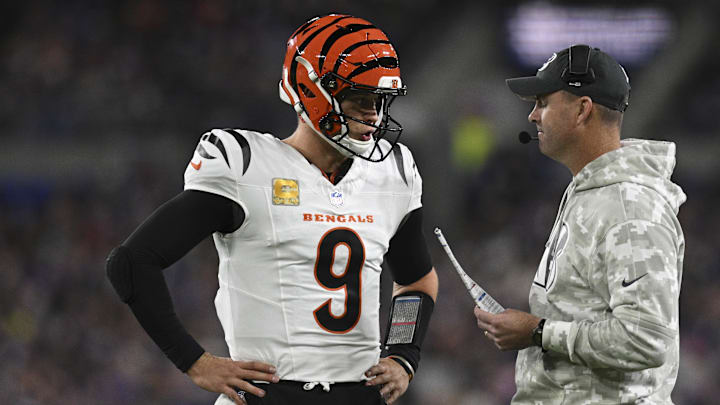 Nov 7, 2024; Baltimore, Maryland, USA; Cincinnati Bengals quarterback Joe Burrow (9) speaks with Cincinnati Bengals head coach Zac Taylor during the first quarter against the Baltimore Ravens at M&T Bank Stadium. Mandatory Credit: Tommy Gilligan-Imagn Images Nov 7, 2024; Baltimore, Maryland, USA; Cincinnati Bengals quarterback Joe Burrow (9) speaks with Cincinnati Bengals head coach Zac Taylor during the first quarter against the Baltimore Ravens at M&T Bank Stadium. Mandatory Credit: Tommy Gilligan-Imagn Images