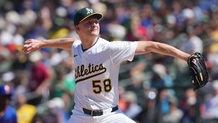 Apr 13, 2025; West Sacramento, California, USA; Athletics pitcher Noah Murdock (58) throws a pitch against the New York Mets during the seventh inning at Sutter Health Park. Mandatory Credit: Darren Yamashita-Imagn Images Apr 13, 2025; West Sacramento, California, USA; Athletics pitcher Noah Murdock (58) throws a pitch against the New York Mets during the seventh inning at Sutter Health Park. Mandatory Credit: Darren Yamashita-Imagn Images