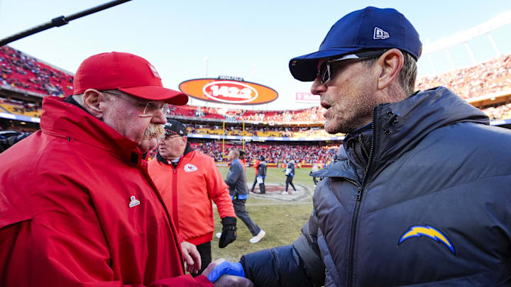 Dec 14, 2025; Kansas City, Missouri, USA; Kansas City Chiefs head coach Andy Reid, left, and Los Angeles Chargers head coach Jim Harbaugh shake hands following a Chargers victory at GEHA Field at Arrowhead Stadium. Mandatory Credit: Jay Biggerstaff-Imagn Images | Jay Biggerstaff-Imagn Images