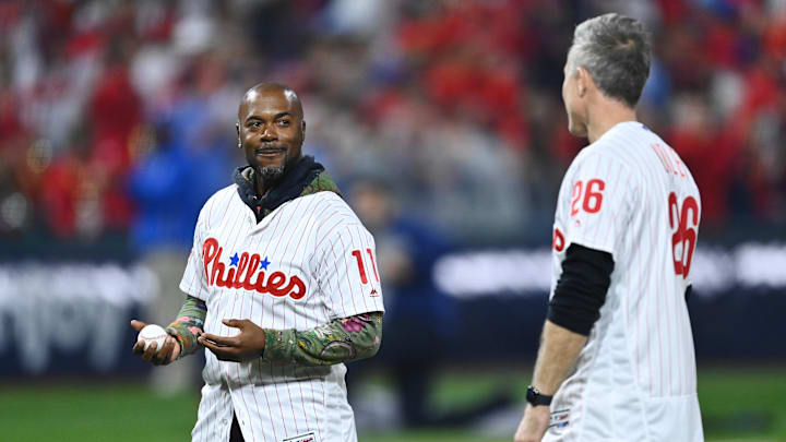 Nov 2, 2022; Philadelphia, Pennsylvania, USA; Former Philadelphia Phillies shortstop Jimmy Rollins and former second baseman Chase Utley look on prior to throwing out a ceremonial first pitch before game four of the 2022 World Series against the Houston Astros at Citizens Bank Park. Nov 2, 2022; Philadelphia, Pennsylvania, USA; Former Philadelphia Phillies shortstop Jimmy Rollins and former second baseman Chase Utley look on prior to throwing out a ceremonial first pitch before game four of the 2022 World Series against the Houston Astros at Citizens Bank Park.