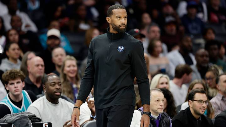 Oct 24, 2026; Charlotte, North Carolina, USA;  Charlotte Hornets head coach Charles Lee watches from the sideline during the fourth quarter against the Miami Heat at Spectrum Center.  Mandatory Credit: Brian Westerholt-Imagn Images