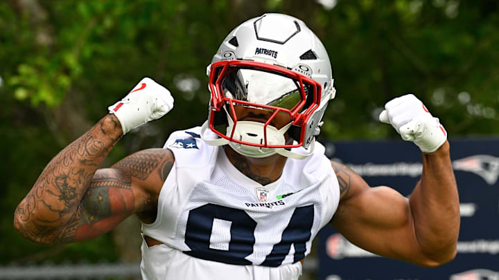 Jun 9, 2025; Foxborough, MA, USA; New England Patriots wide receiver Kendrick Bourne (84) flexes on his way to the practice fields at Gillette Stadium. Mandatory Credit: Eric Canha-Imagn Images