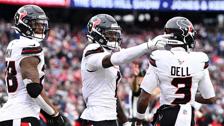 Oct 13, 2024; Foxborough, Massachusetts, USA; Houston Texans wide receiver Stefon Diggs (1) celebrates after scoring a touchdown against the New England Patriots during the second half at Gillette Stadium.