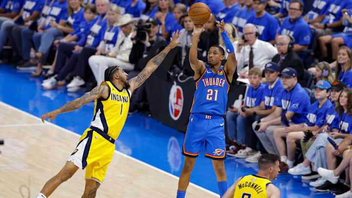 Jun 8, 2025; Oklahoma City, Oklahoma, USA; Oklahoma City Thunder guard Aaron Wiggins (21) shoots over Indiana Pacers forward Obi Toppin (1) during the second quarter of game two of the 2025 NBA Finals at Paycom Center. Mandatory Credit: Alonzo Adams-Imagn Images Jun 8, 2025; Oklahoma City, Oklahoma, USA; Oklahoma City Thunder guard Aaron Wiggins (21) shoots over Indiana Pacers forward Obi Toppin (1) during the second quarter of game two of the 2025 NBA Finals at Paycom Center. Mandatory Credit: Alonzo Adams-Imagn Images
