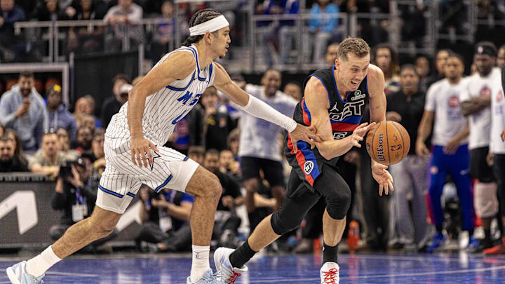 Nov 28, 2025; Detroit, Michigan, USA; Detroit Pistons forward Duncan Robinson (55) steals the ball away from Orlando Magic guard Anthony Black (0) in the second half of the annual in-season NBA Cup tournament at Little Caesars Arena. Mandatory Credit: David Reginek-Imagn Images Nov 28, 2025; Detroit, Michigan, USA; Detroit Pistons forward Duncan Robinson (55) steals the ball away from Orlando Magic guard Anthony Black (0) in the second half of the annual in-season NBA Cup tournament at Little Caesars Arena. Mandatory Credit: David Reginek-Imagn Images