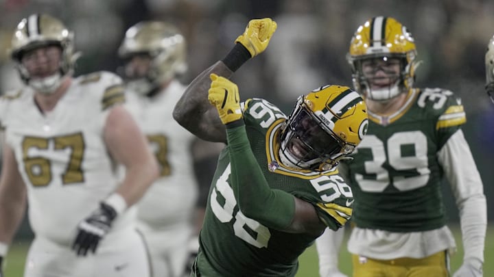 Dec 23, 2024; Green Bay, Wisconsin, USA;  Green Bay Packers linebacker Edgerrin Cooper (56) celebrates a tackle for a three-yard loss during the second quarter against the New Orleans Saints at Lambeau Field. Mandatory Credit: Mark Hoffman/Milwaukee Journal Sentinel/Imagn Images