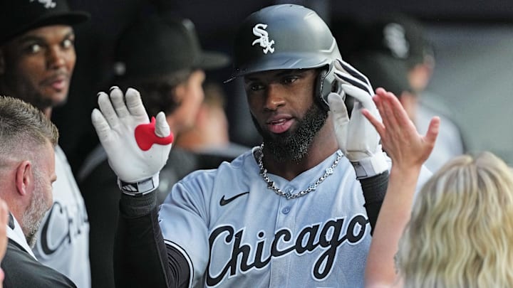 Jun 20, 2025; Toronto, Ontario, CAN; Chicago White Sox centre fielder Luis Robert Jr. (88) celebrates in the dugout after hitting a two run home run against the Toronto Blue Jays during the third inning at Rogers Centre. Mandatory Credit: Nick Turchiaro-Imagn Images