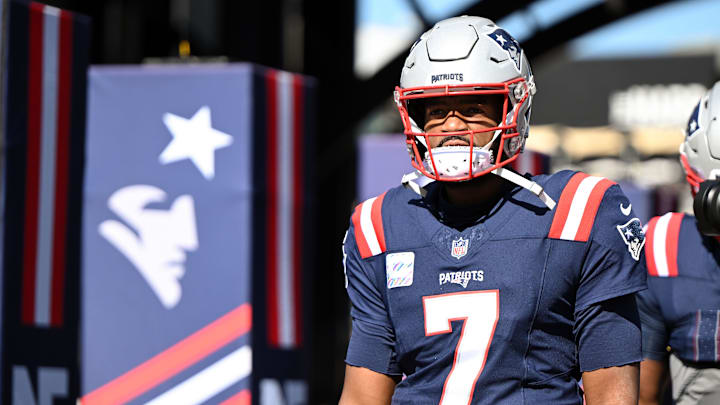Oct 6, 2024; Foxborough, Massachusetts, USA;  New England Patriots quarterback Jacoby Brissett (7) walks onto the field before a game against the Miami Dolphins at Gillette Stadium.