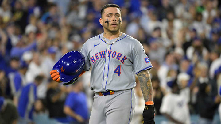 Oct 20, 2024; Los Angeles, California, USA; New York Mets catcher Francisco Alvarez (4) reacts in the sixth inning against the Los Angeles Dodgers during game six of the NLCS for the 2024 MLB playoffs at Dodger Stadium. Mandatory Credit: Jayne Kamin-Oncea-Imagn Images