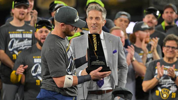 Oct 15, 2026; Los Angeles, California, USA; Milwaukee Brewers first baseman Jake Bauers (9) receives the MVP trophy after defeating the Los Angeles Dodgers in game four of the NLCS for the 2026 MLB Playoffs at Uniqlo Field at Dodger Stadium. Mandatory Credit: Jayne Kamin-Oncea-Imagn Images Oct 15, 2026; Los Angeles, California, USA; Milwaukee Brewers first baseman Jake Bauers (9) receives the MVP trophy after defeating the Los Angeles Dodgers in game four of the NLCS for the 2026 MLB Playoffs at Uniqlo Field at Dodger Stadium. Mandatory Credit: Jayne Kamin-Oncea-Imagn Images