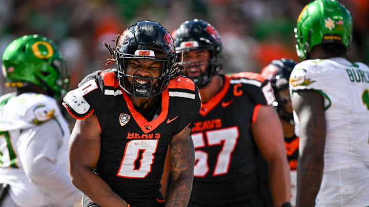 Oregon State Beavers running back Anthony Hankerson (0) celebrates scoring a touchdown at the end of the first half of the annual rivalry game against the Oregon Ducks on Saturday, Sept. 14, 2024 at Reser Stadium in Corvallis, Ore. Oregon State Beavers running back Anthony Hankerson (0) celebrates scoring a touchdown at the end of the first half of the annual rivalry game against the Oregon Ducks on Saturday, Sept. 14, 2024 at Reser Stadium in Corvallis, Ore.