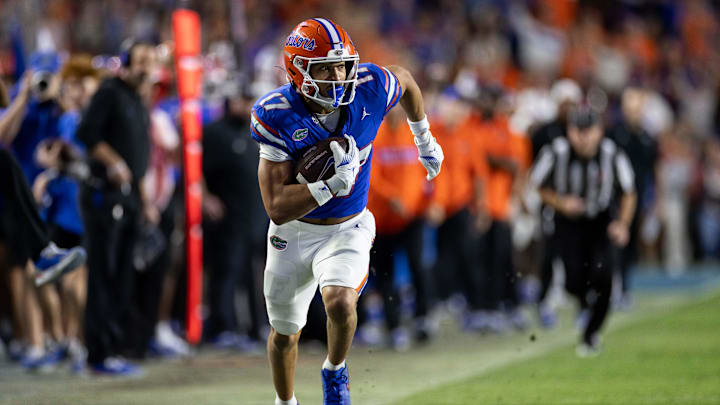 Oct 19, 2024; Gainesville, Florida, USA; Florida Gators wide receiver Chimere Dike (17) runs with the ball against the Kentucky Wildcats during the second half at Ben Hill Griffin Stadium. Mandatory Credit: Matt Pendleton-Imagn Images