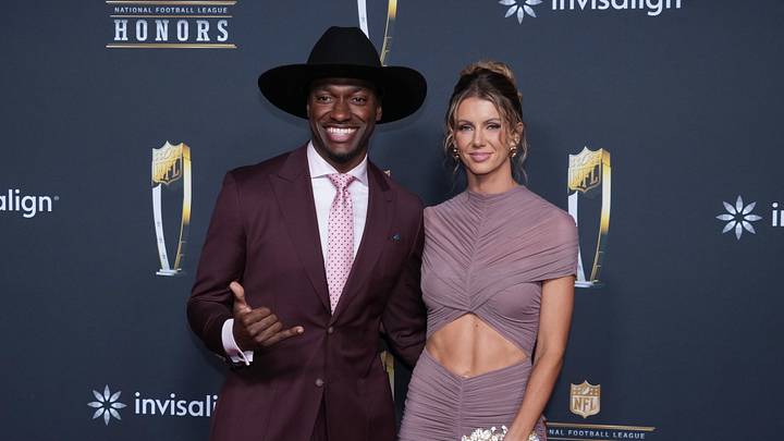 Robert Griffin III, pictured with his wife Grete Griffin, shared his thoughts on a possible way to structure a 24-team College Football Playoff.