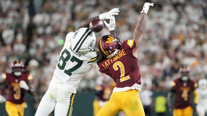 Sep 11, 2025; Green Bay, Wisconsin, USA; Green Bay Packers wide receiver Romeo Doubs (87) cannot make a catch against Washington Commanders cornerback Marshon Lattimore (2) in the second quarter at Lambeau Field. Mandatory Credit: Jeff Hanisch-Imagn Images Sep 11, 2025; Green Bay, Wisconsin, USA; Green Bay Packers wide receiver Romeo Doubs (87) cannot make a catch against Washington Commanders cornerback Marshon Lattimore (2) in the second quarter at Lambeau Field. Mandatory Credit: Jeff Hanisch-Imagn Images