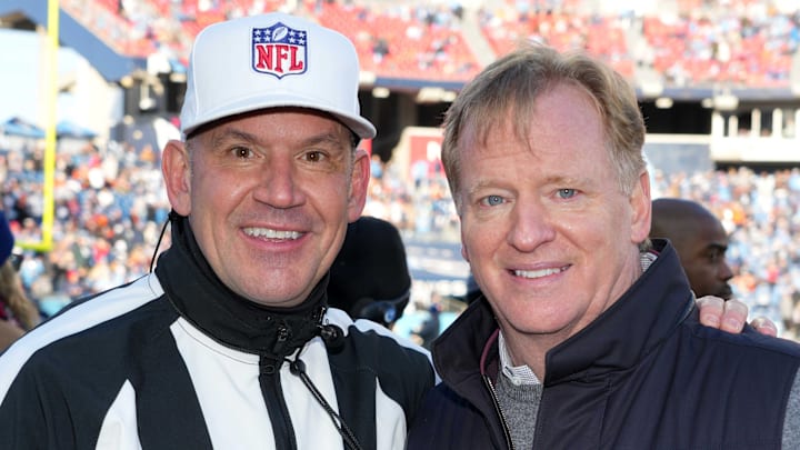 Jan 22, 2022; Nashville, Tennessee, USA; NFL commissioner Roger Goodell (right) poses with referee Clete Blakeman during a AFC Divisional playoff football game between the Cincinnati Bengals and the Tennessee Titans at Nissan Stadium. Mandatory Credit: Kirby Lee-Imagn Images Jan 22, 2022; Nashville, Tennessee, USA; NFL commissioner Roger Goodell (right) poses with referee Clete Blakeman during a AFC Divisional playoff football game between the Cincinnati Bengals and the Tennessee Titans at Nissan Stadium. Mandatory Credit: Kirby Lee-Imagn Images