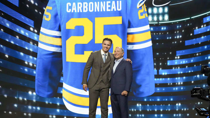 Jun 27, 2025; Los Angeles, California, USA; Justin Carbonneau is selected as the 19th overall pick to the St. Louis Blues in the first round of the 2025 NHL Draft at Peacock Theater. Mandatory Credit: Kirby Lee-Imagn Images
