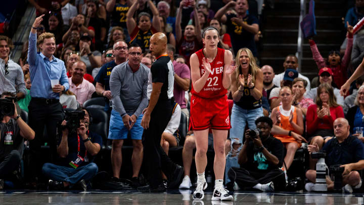 Indiana Fever guard Caitlin Clark (22) celebrates scoring Saturday, July 6, 2024, during the game at Gainbridge Fieldhouse in Indianapolis. Indiana Fever guard Caitlin Clark (22) celebrates scoring Saturday, July 6, 2024, during the game at Gainbridge Fieldhouse in Indianapolis.