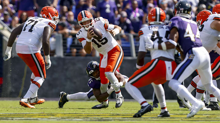 Sep 14, 2025; Baltimore, Maryland, USA; Cleveland Browns quarterback Joe Flacco (15) is pressured by Baltimore Ravens linebacker Mike Green (45) during the second quarter at M&T Bank Stadium. Mandatory Credit: Peter Casey-Imagn Images