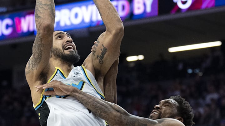 December 22, 2024; Sacramento, California, USA; Indiana Pacers forward Obi Toppin (1) shoots the basketball against Sacramento Kings guard Malik Monk (0) during the fourth quarter at Golden 1 Center. Mandatory Credit: Kyle Terada-Imagn Images