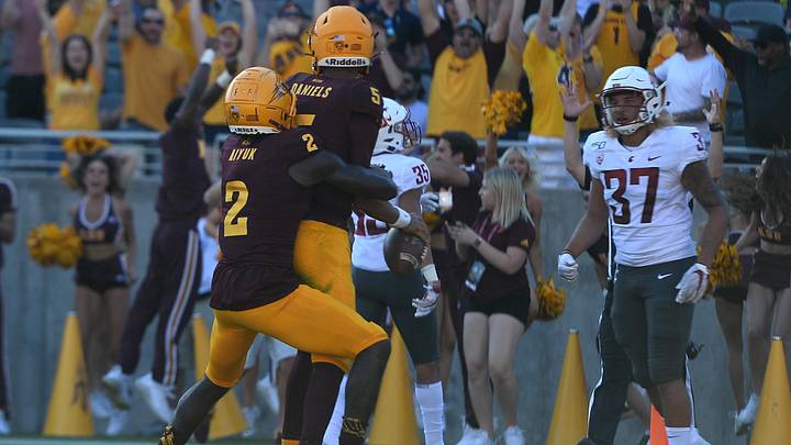 Oct 12, 2019; Tempe, AZ, USA; Arizona State Sun Devils quarterback Jayden Daniels (5) celebrates his touchdown with Arizona State Sun Devils wide receiver Brandon Aiyuk (2) touchdown against the Washington State Cougars during the second half at Sun Devil Stadium. Mandatory Credit: Joe Camporeale-Imagn Images Oct 12, 2019; Tempe, AZ, USA; Arizona State Sun Devils quarterback Jayden Daniels (5) celebrates his touchdown with Arizona State Sun Devils wide receiver Brandon Aiyuk (2) touchdown against the Washington State Cougars during the second half at Sun Devil Stadium. Mandatory Credit: Joe Camporeale-Imagn Images