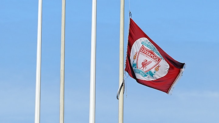 A Liverpool flag flies at half-mast at Anfield Stadium following the death of Diogo Joto. 