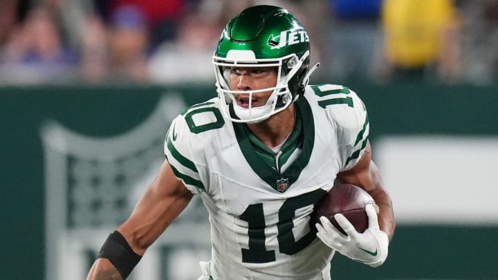 New York Jets wide receiver Allen Lazard (10) runs with the ball in the second half. The Jets defeat the Bills in overtime, 22-16, in the home opener at MetLife Stadium on Monday, Sept. 11, 2023, in East Rutherford.