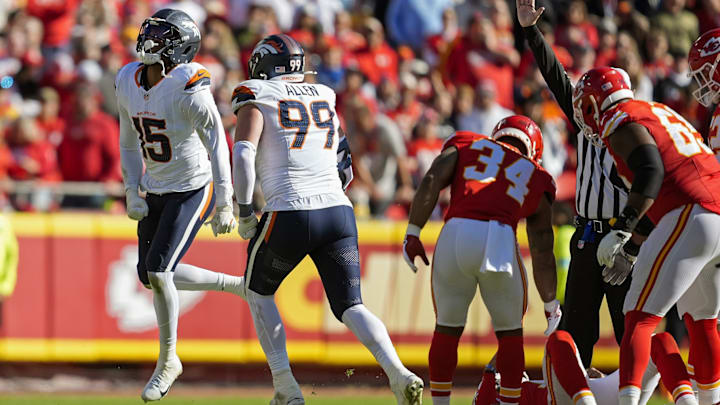 Nov 10, 2024; Kansas City, Missouri, USA; Denver Broncos linebacker Nik Bonitto (15) celebrates after a play during the first half against the Kansas City Chiefs at GEHA Field at Arrowhead Stadium. 