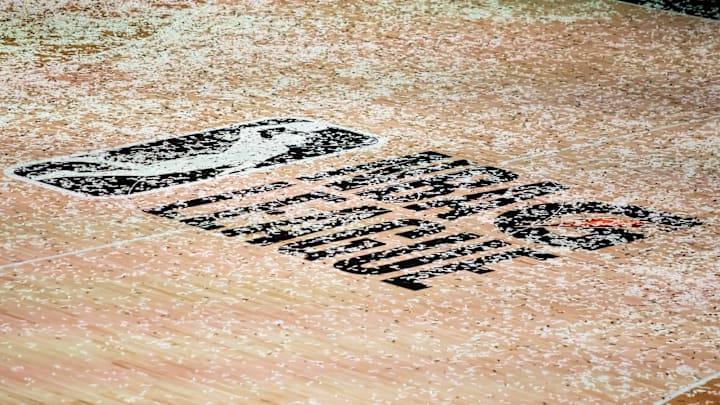 Mar 11, 2021; Orlando, Florida, USA; The NBA G League logo is covered in confetti after the Final between the Delaware Blue Coats and the Lakeland Magic at AdventHealth Arena. Mandatory Credit: Mary Holt-Imagn Images