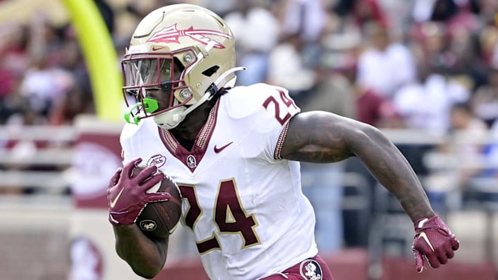 Apr 20, 2024; Tallahassee, Florida, USA; Florida State Seminoles running back Roydell Williams (24) runs the ball during the Spring Showcase at Doak S. Campbell Stadium. Mandatory Credit: Melina Myers-Imagn Images