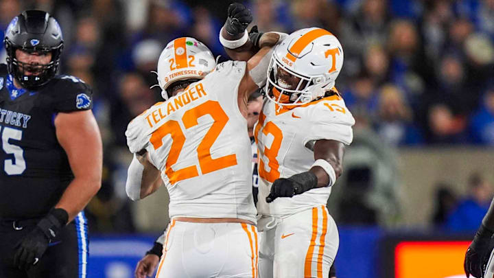 Tennessee linebacker Jeremiah Telander (22) and Tennessee linebacker Edwin Spillman (13) celebrate after a tackle during a NCAA football game against Kentucky at Kroger Field in Lexington, Kentucky on Oct. 25, 2025. Tennessee linebacker Jeremiah Telander (22) and Tennessee linebacker Edwin Spillman (13) celebrate after a tackle during a NCAA football game against Kentucky at Kroger Field in Lexington, Kentucky on Oct. 25, 2025.