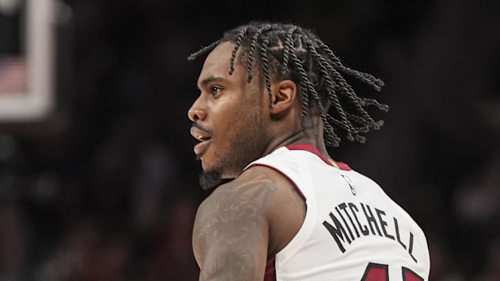 Apr 18, 2025; Atlanta, Georgia, USA; Miami Heat guard Davion Mitchell (45) reacts against the Atlanta Hawks during overtime at State Farm Arena. Mandatory Credit: Dale Zanine-Imagn Images