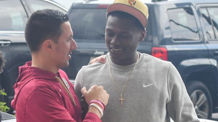 Florida State GM Darrick Yray greets 5-star prospect Charles Lester on Friday, March 10, 2023.

Charleslester 1 Of 1