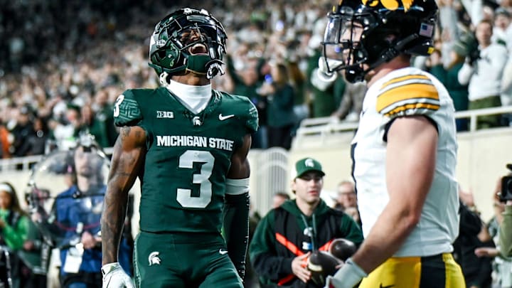 Michigan State's Montorie Foster Jr., left, celebrates his touchdown catch against Iowa during the third quarter on Saturday, Oct. 19, 2024, at Spartan Stadium in East Lansing.