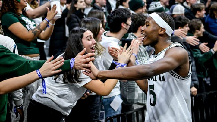 Michigan State's Tre Holloman greets fans after the Spartans win over Illinois on Sunday, Jan. 19, 2025, at the Breslin Center in East Lansing. Michigan State's Tre Holloman greets fans after the Spartans win over Illinois on Sunday, Jan. 19, 2025, at the Breslin Center in East Lansing.