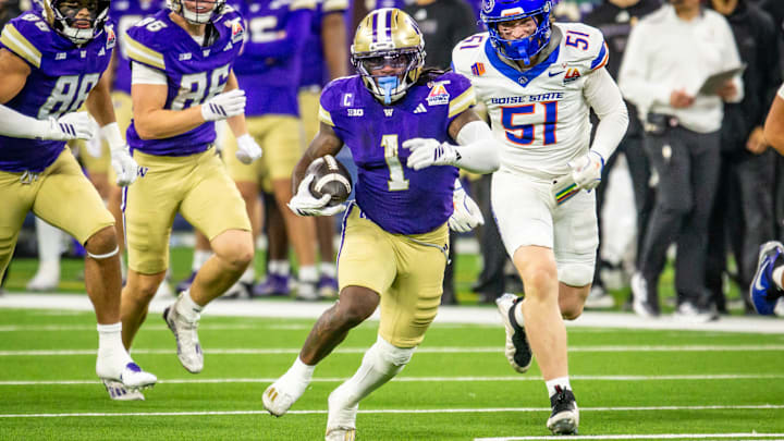 Jonah Coleman gets free on a 25-yard run against Boise State. Jonah Coleman gets free on a 25-yard run against Boise State.