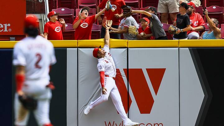 Jun 14, 2026; Cincinnati, Ohio, USA; Cincinnati Reds outfielder Noelvi Marte (4) attempts to catch a solo home run hit by Arizona Diamondbacks catcher Gabriel Moreno (not pictured) in the eighth inning at Great American Ball Park. Mandatory Credit: Katie Stratman-Imagn Images Jun 14, 2026; Cincinnati, Ohio, USA; Cincinnati Reds outfielder Noelvi Marte (4) attempts to catch a solo home run hit by Arizona Diamondbacks catcher Gabriel Moreno (not pictured) in the eighth inning at Great American Ball Park. Mandatory Credit: Katie Stratman-Imagn Images