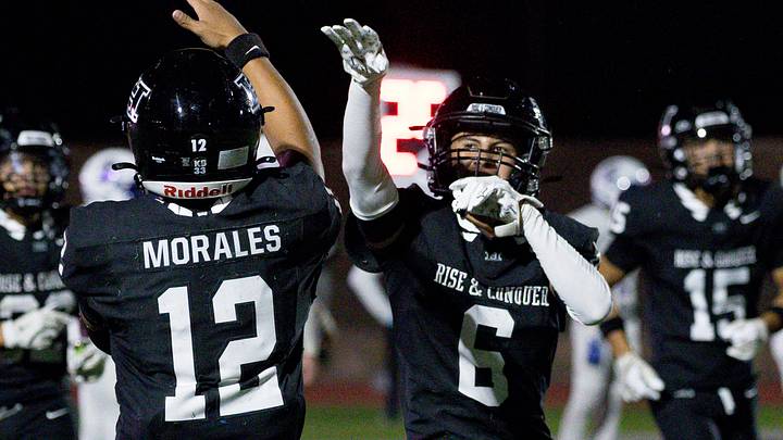 Hanks’ Jordan Morales (12) and Alex Robles (6) celebrate during a game against Americas on Thursday, Sept. 4, 2025, at Hanks High School in El Paso, Texas. Hanks’ Jordan Morales (12) and Alex Robles (6) celebrate during a game against Americas on Thursday, Sept. 4, 2025, at Hanks High School in El Paso, Texas.