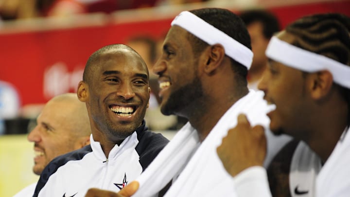 Aug. 20, 2008; Beijing, CHINA; United States guard Kobe Bryant (10) and LeBron James (6) on the bench during the USA 116-85 victory against Australia in the quarterfinals at the Beijing Olympic Basketball Stadium in the 2008 Beijing Olympics. Mandatory Credit: Bob Donnan-Imagn Images