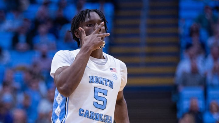 Dec 22, 2025; Chapel Hill, North Carolina, USA; North Carolina Tar Heels guard Isaiah Denis (5) celebrates during the second half against the East Carolina Pirates at Dean E. Smith Center. Mandatory Credit: Scott Kinser-Imagn Images