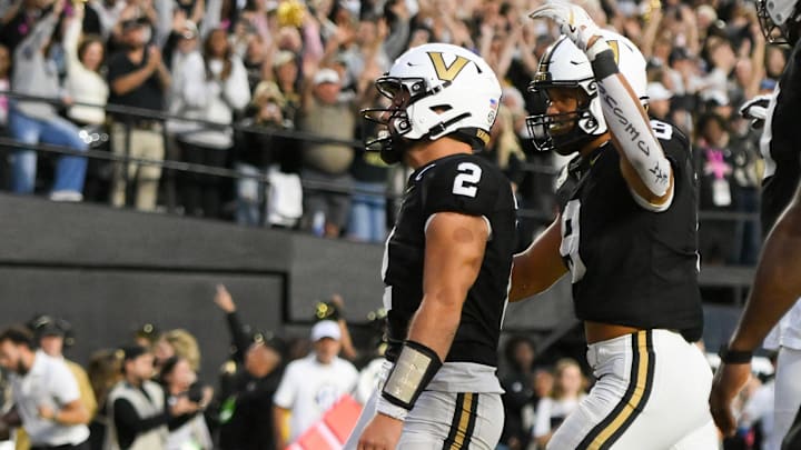 Oct 25, 2025; Nashville, Tennessee, USA; Vanderbilt Commodores quarterback Diego Pavia (2) celebrates the touchdown of quarterback Diego Pavia (2) against the Missouri Tigers during the second half at FirstBank Stadium. Mandatory Credit: Steve Roberts-Imagn Images Oct 25, 2025; Nashville, Tennessee, USA; Vanderbilt Commodores quarterback Diego Pavia (2) celebrates the touchdown of quarterback Diego Pavia (2) against the Missouri Tigers during the second half at FirstBank Stadium. Mandatory Credit: Steve Roberts-Imagn Images