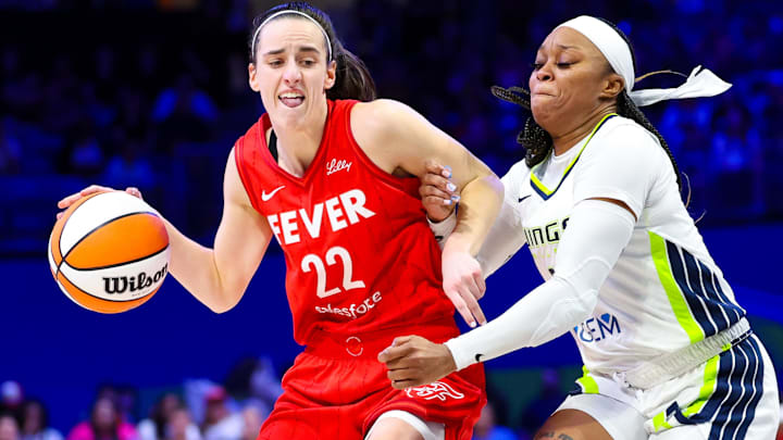 Jul 17, 2024; Arlington, Texas, USA; Indiana Fever guard Caitlin Clark (22) dribbles as Dallas Wings guard Odyssey Sims (2) defends during the second half at College Park Center. Jul 17, 2024; Arlington, Texas, USA; Indiana Fever guard Caitlin Clark (22) dribbles as Dallas Wings guard Odyssey Sims (2) defends during the second half at College Park Center.