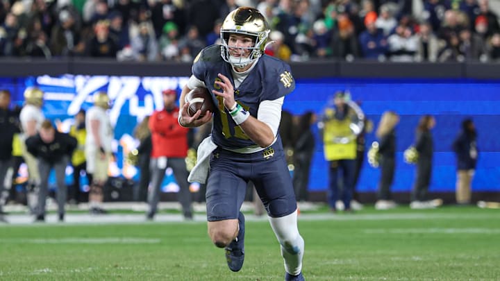 Nov 23, 2024; New York, New York, USA; Notre Dame Fighting Irish quarterback Riley Leonard (13) rushes during the first half against the Army Black Knights at Yankee Stadium. Mandatory Credit: Vincent Carchietta-Imagn Images Nov 23, 2024; New York, New York, USA; Notre Dame Fighting Irish quarterback Riley Leonard (13) rushes during the first half against the Army Black Knights at Yankee Stadium. Mandatory Credit: Vincent Carchietta-Imagn Images